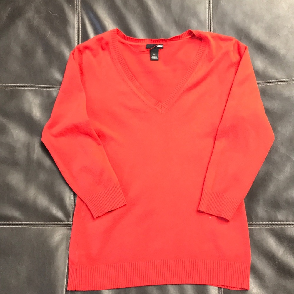 Orange large H&M sweater.Lighter sweater material.